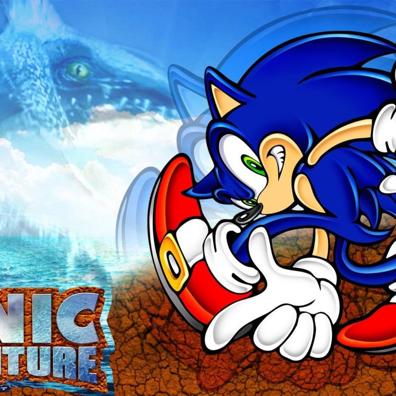 Sonic the Hedgehog posing in front of a background with blue sky/water and a rocky ground. The words "Sonic Adventure" appear at the bottom left, stylized