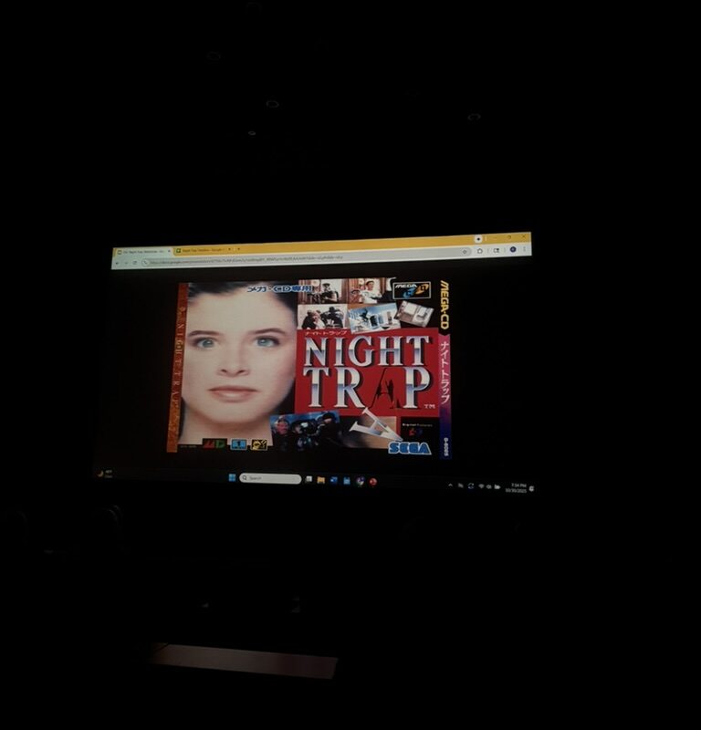 Projected image of the 1992 game Night Trap displayed during the live playthrough at the University of Chicago’s Logan Center.